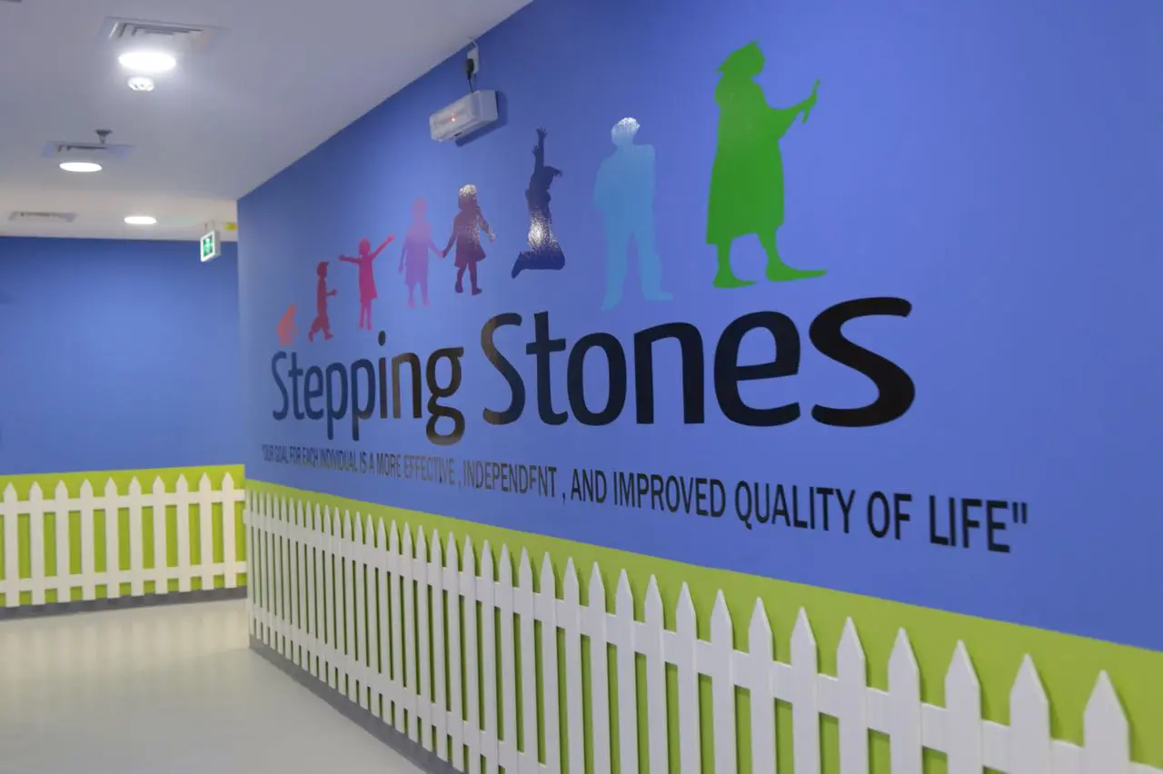 A hallway painted with the Stepping Stones name