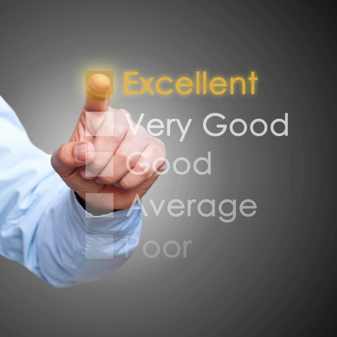A hand pointing at the word 'Excellent' on a transparent screen.
